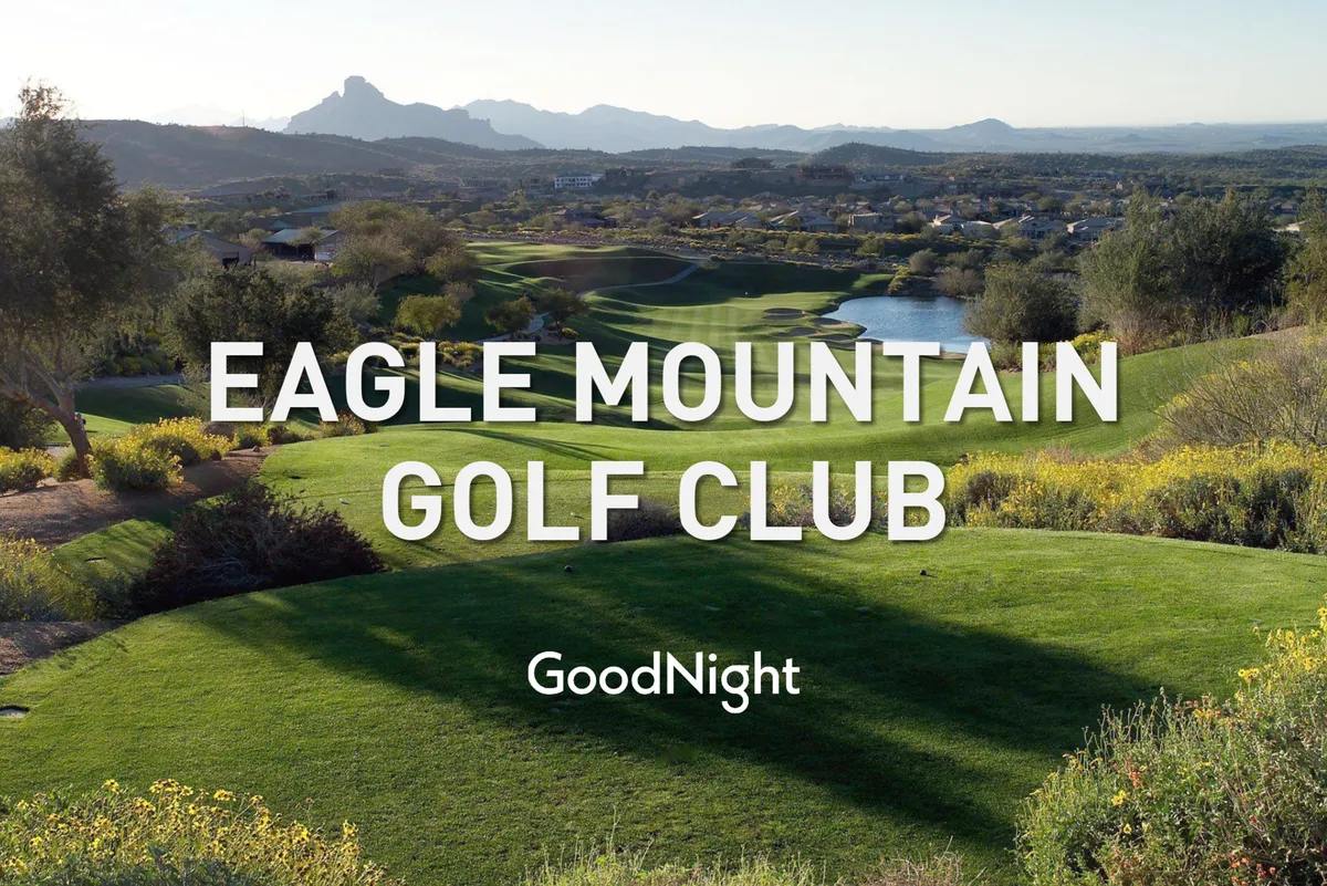 This image highlights a lush golf course framed by mountains in the background, with a tranquil water feature in the foreground and abundant greenery throughout. The serene atmosphere and open landscape evoke the experience of playing or relaxing on one of Scottsdale's premier courses.